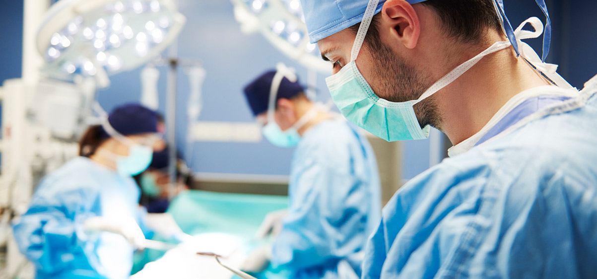 Medical team working in a surgical environment
